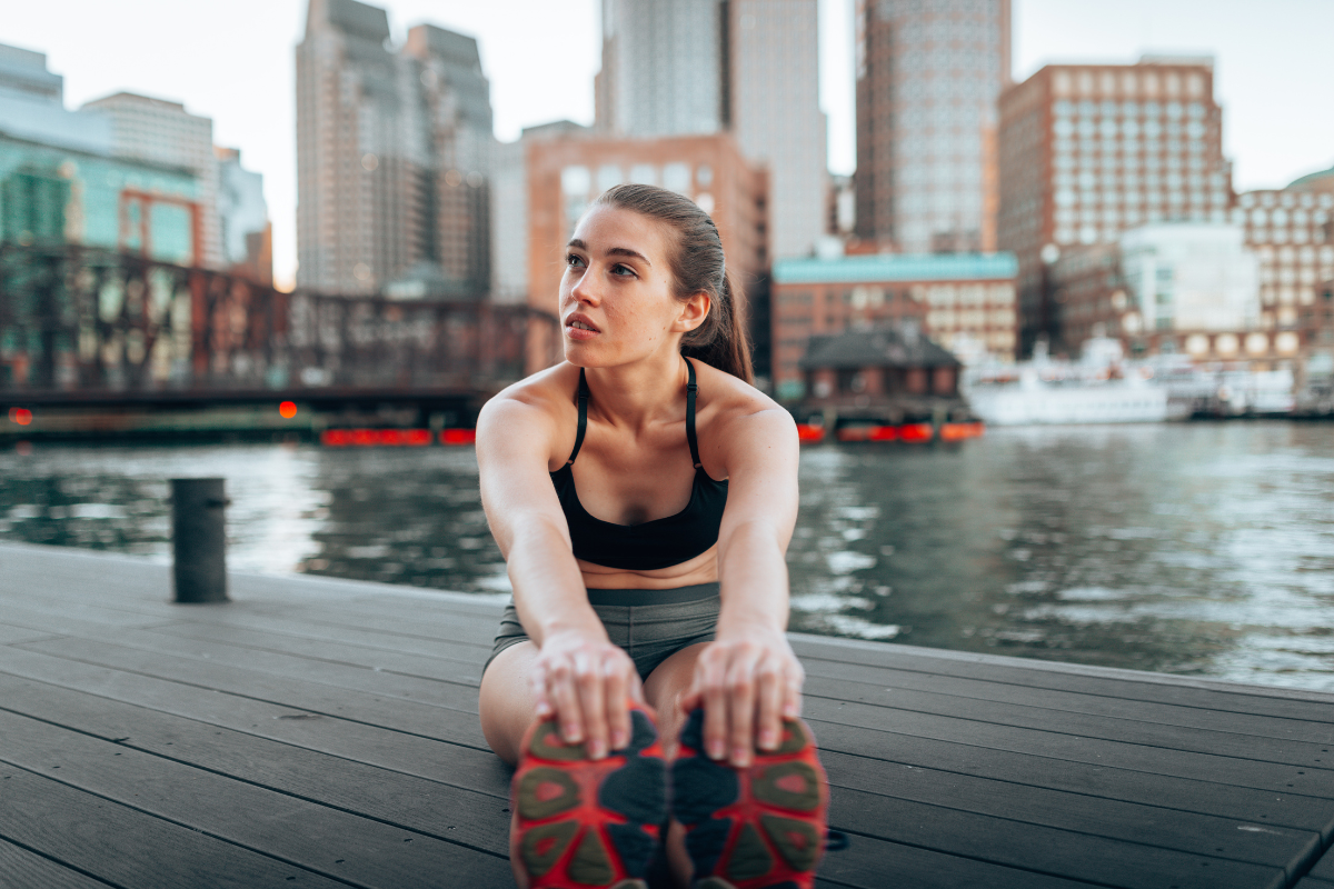 Runner sat on the Boston waterfront