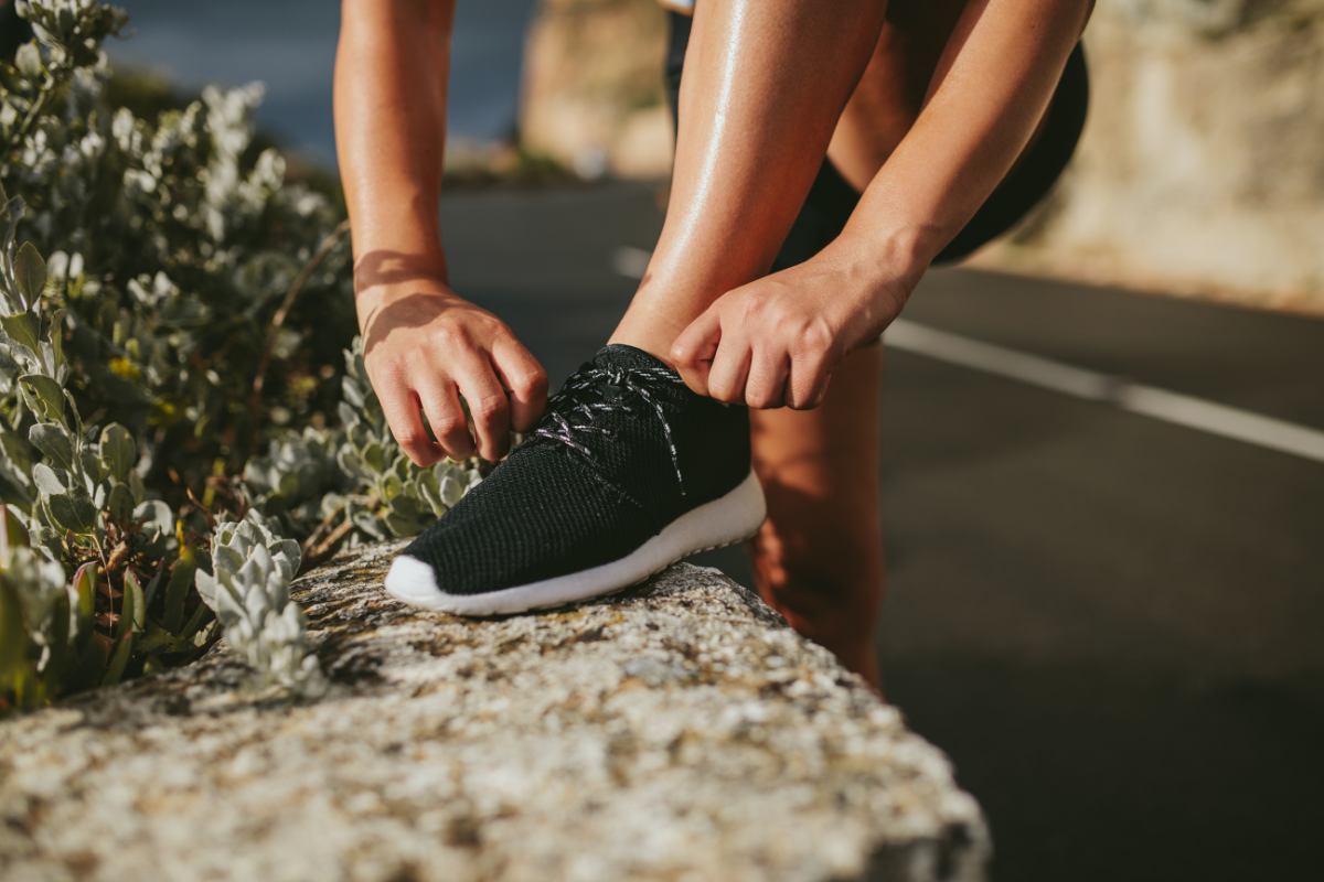 Woman tying the laces on her running laces
