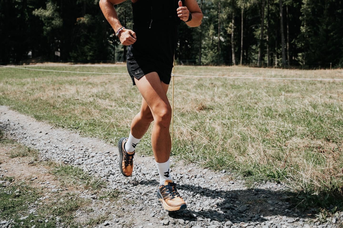 Runner running along a trail route